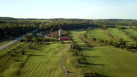 Aerial DroneTracking Golf Course on Niagara Escarpment at Sunrise – 4K 30fps Stock-Footage 313912107