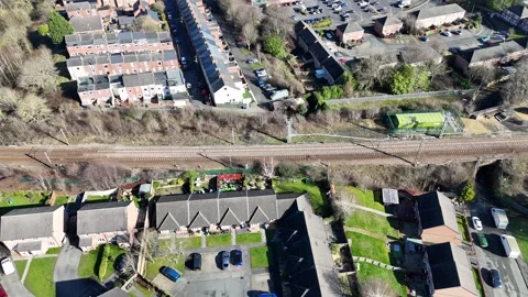 Aerial DroneTracking Sideways Reveal of Red Brick Railway Viaduct Urban Stock Footage 330335703