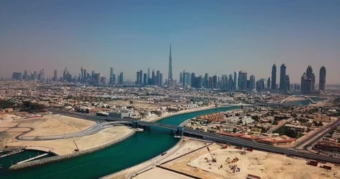 Aerial Dubai Skyscrapers & Skyline with Canal View to Burj Khalifa Stock Footage