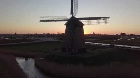 Aerial Dutch sunrise over windmill Stock Footage