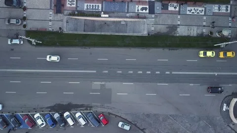 Aerial Eagle Eye Shot Over Traffic With Parked Vehicles and Traffic 스톡 동영상 222361121