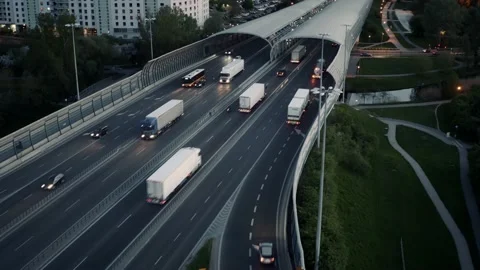 Aerial elevated road junction. Highway in evening. Intersection freeway overpass Stock Footage 193738310