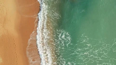Aerial Elevating Drone Shot. Flying along the ocean coast. View of the sea waves Stock-Footage 134324760