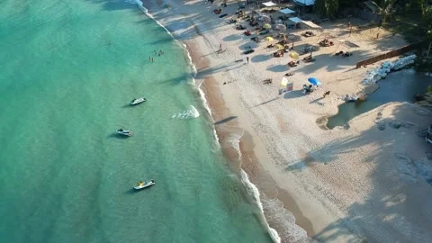 Aerial Elevating Drone Shot. Flying along the ocean coast. View of the sea waves Stock Footage 134324964