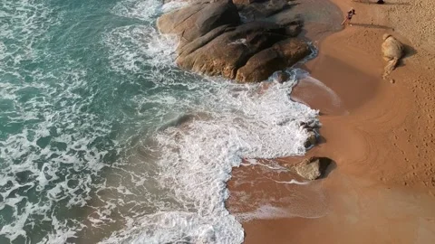 Aerial Elevating Drone Shot. Flying along the ocean coast. View of the sea waves Stock-Footage 134325223
