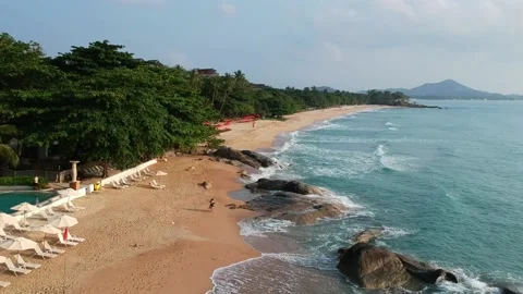 Aerial Elevating Drone Shot. Flying along the ocean coast. View of the sea waves Stock Footage 134326476