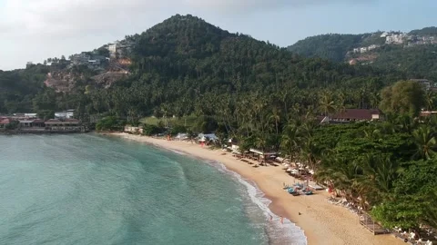 Aerial Elevating Drone Shot. Flying along the ocean coast. View of the sea waves Stock Footage 134402925
