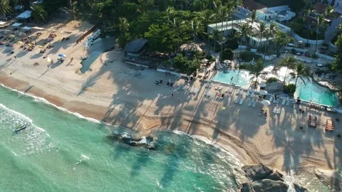 Aerial Elevating Drone Shot. Flying along the ocean coast. View of the sea waves Stock Footage 136827815