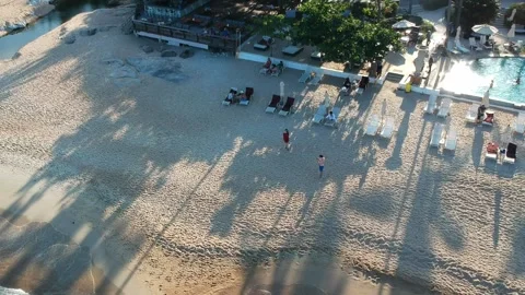 Aerial Elevating Drone Shot. Flying over the ocean coast. View of the sea waves Video stock 136827954