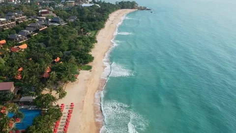 Aerial Elevating Drone Shot. Flying along the ocean coast. View of the sea waves Stock Footage 137583902
