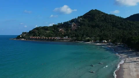 Aerial Elevating Drone Shot. Flying along the ocean coast. View of the sea waves Stock Footage 138569119