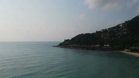 Aerial Elevating Drone Shot. Flying over the ocean coast. View of the sea waves Stock Footage 139553854