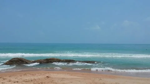 Aerial Elevating Drone Shot. Ocean coast. View of the sea waves, sandy beach Stock Footage 134324542