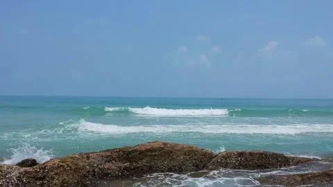 Aerial Elevating Drone Shot. Ocean coast. View of the sea waves, sandy beach Stock Footage 134325152