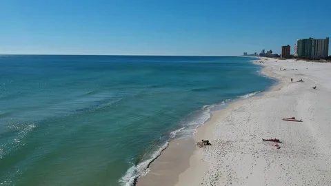 Aerial Elevating Shot of Clear Sandy Beach Stock Footage 129244250
