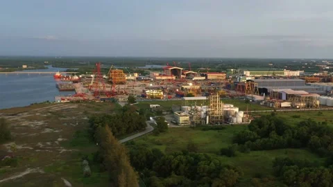 Aerial elevation shot capturing Petron Lumut POME Plant and Grade one Stock Footage 224490981