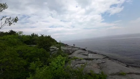 Aerial Embrace of Spring: FPV Drone's Tour of Rocky Point Stockbeeldmateriaal 243367128