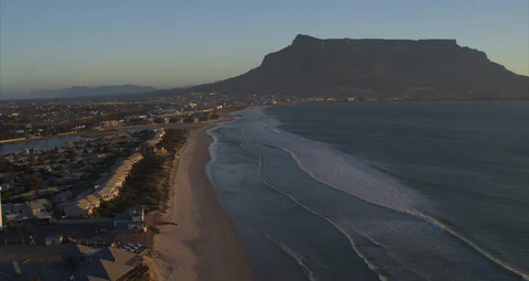 Aerial of Empty Beach with Table Mountain in Background During Lockdown 6K Stock Footage