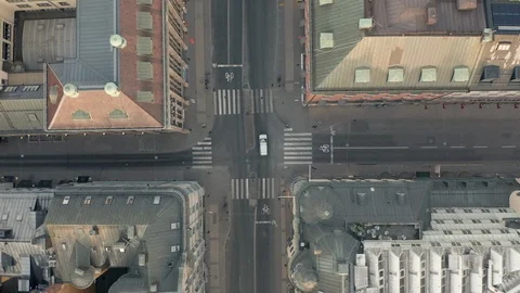 Aerial of empty intersection in urban environment during Covid-19 Coronavirus Stock Footage 129396077