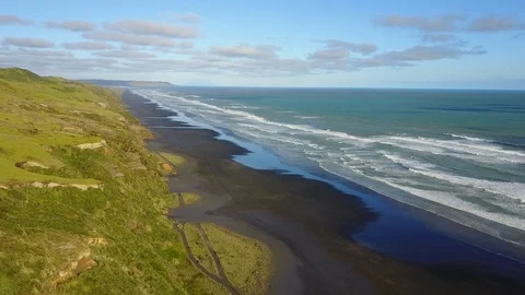 Aerial: Empty long sandy beach. New Zealand 库存影片 91056137