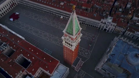 Aerial empty St. Marks Square tilt up to reveal Venice, Italy Видео 137144485