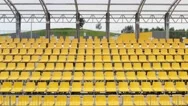 Aerial Empty Stadium Seats During Coronavirus Covid-19. Rows And Yellow Seats Stock Footage