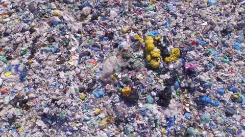 AERIAL: Endless pile of plastic bottles, bags and other waste Stock Footage