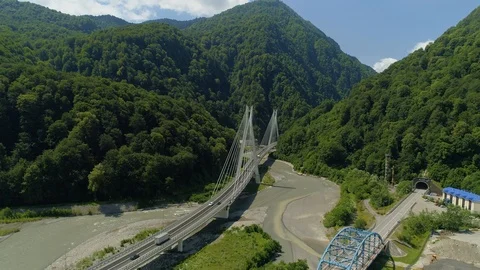 Aerial epic modern cable-stayed road bridge resort Sochi Russia freeway traffic Stock Footage 122632034