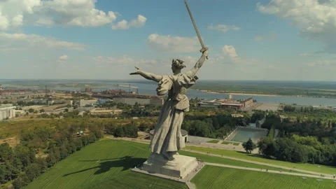 Aerial epic old Soviet huge monument woman motherland Volgograd Russia cityscape Stock Footage 146834801