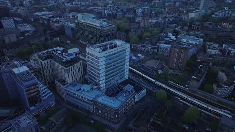 Aerial Establishing Shot Looking Down on London City at Night / Dawn / Dusk Stock Footage 307029223