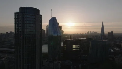 Aerial Establishing Shot Tracking Right Showing Canary Wharf and City Skyline Stock Footage 307032454