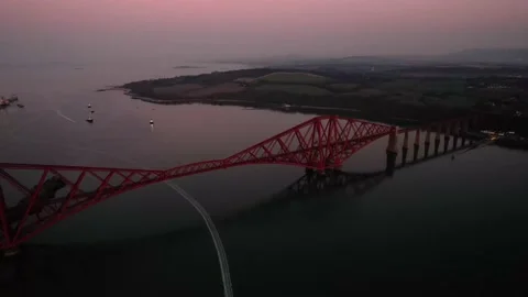 Aerial Evening View of Forth Rail Bridge and Firth of Forth at Sunset Stock Footage 172549745