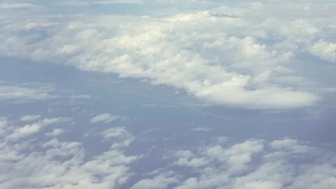 Aerial expansive view of the sky, showcasing cumulus clouds and the horizon Stock Footage 299084143
