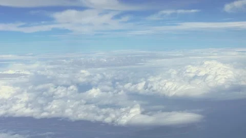 Aerial expansive view of the sky, showcasing cumulus clouds and the horizon Stock Footage 307571825