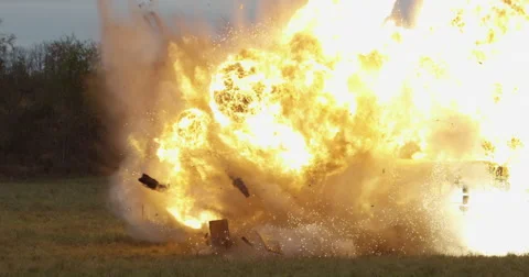 Aerial of Exploding School Bus - Fiery automobile - flames and smoke Stock Footage 56136526