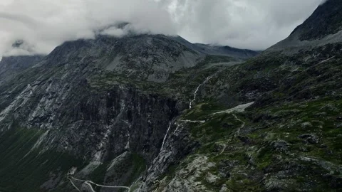 Aerial Exploring Trollfossen Waterfall and Storgrovfjellet Mountain in Norway Stock Footage 330104628