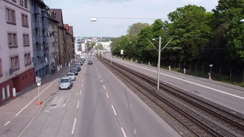 Aerial eye overhead top down view of cars driving on streets passing through Stock Footage 238493671