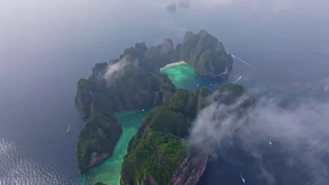 Aerial of famous Koh Phi Phi Lee with Maya Bay and scenic cliffs Stock Footage 303357620