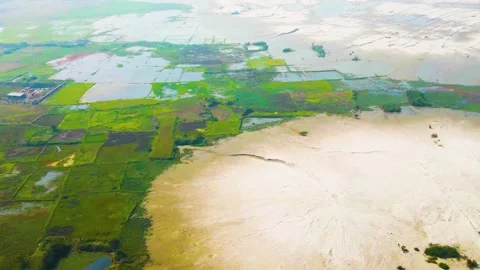 Aerial: farm crops flooded in Bangladesh, natural disaster climate change Stock Footage