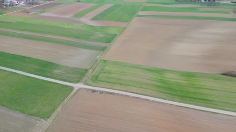 Aerial farmland patchwork grid landscape for agriculture background with field Stock Footage 333498318