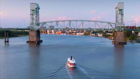 Aerial: Ferry boat on the Cape Fear River, Wilmington, North Carolina, USA Stock Footage