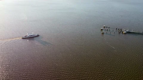 Aerial of a ferry coming in to dock Stock Footage 161270160