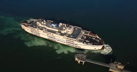 Aerial of Ferry Pulling Into Dock on Calm Day On Vancouver Island 스톡 동영상 246770080