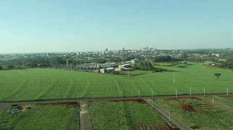 Aerial field with city in the background Stock Footage 50061086
