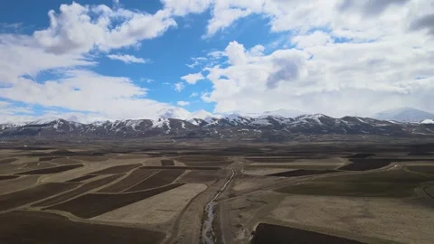 Aerial fields mountains landscape Stock Footage 240120825