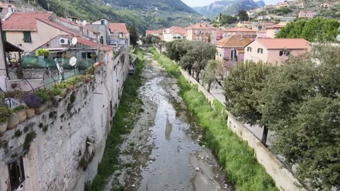 Aerial Finalborgo on the river 2 Stock Footage 192017291