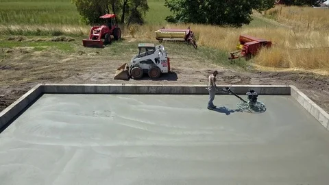 Aerial finish concrete work construction power tool 4K Stock Footage 78644457