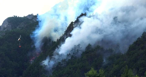 Aerial firefighting with helicopter Stock Footage 94951344
