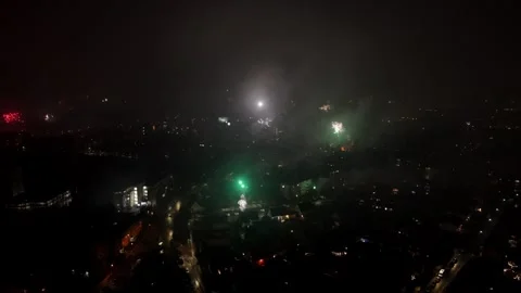 Aerial fireworks exploding over Berlin cityscape at night Stock Footage 333700584
