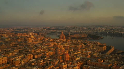 AERIAL // First light casting over the capital city of Malta, Valletta Stock Footage 170554140